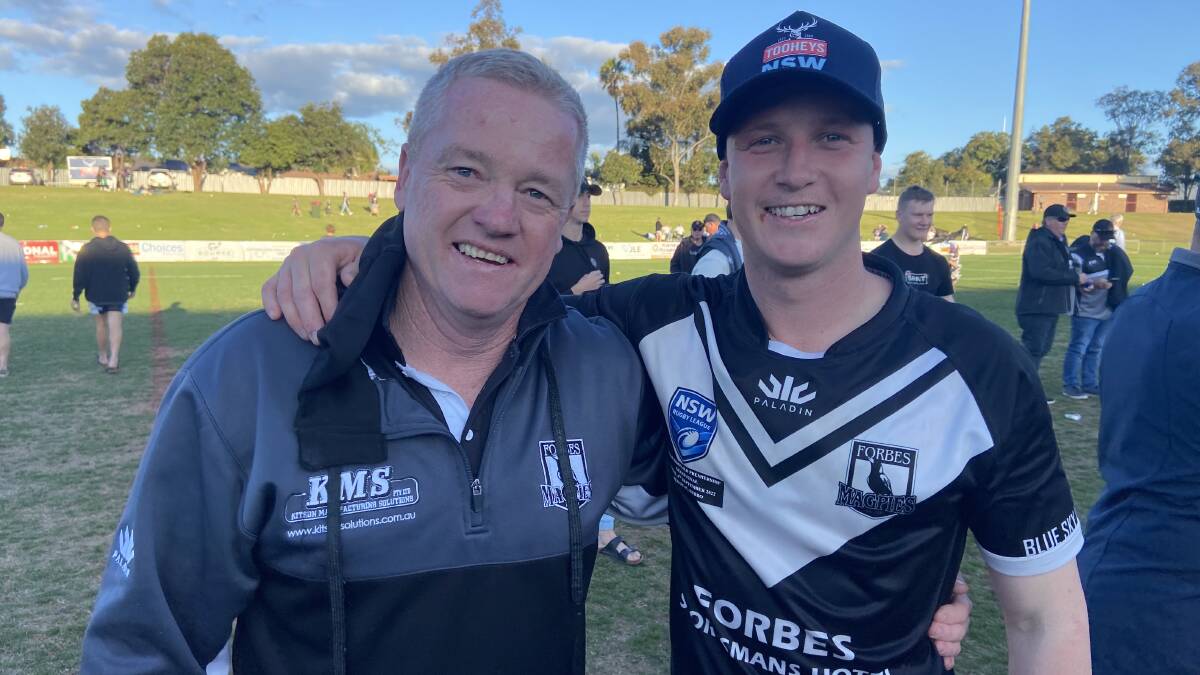 Father and son Cameron and Nick Greenhalgh celebrated Sunday's grand final win as coach and captain of the Forbes Magpies. Picture by Nick Guthrie