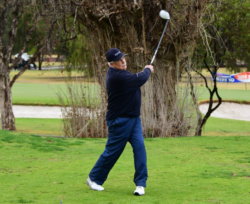 HITTING OUT: Col Darley in action at Dubbo Golf Club in recent months. The course will be busy on Monday. Photo: BELINDA SOOLE