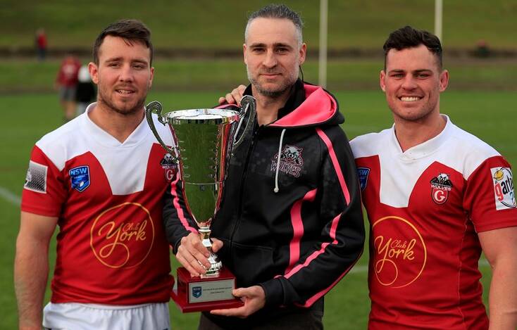 IMPACT: The well-known Jackson Garlick (right) with Liam Coleman and coach Aaron Zammit after his side's recent Challenge Cup win. Photo: CONTRIBUTED
