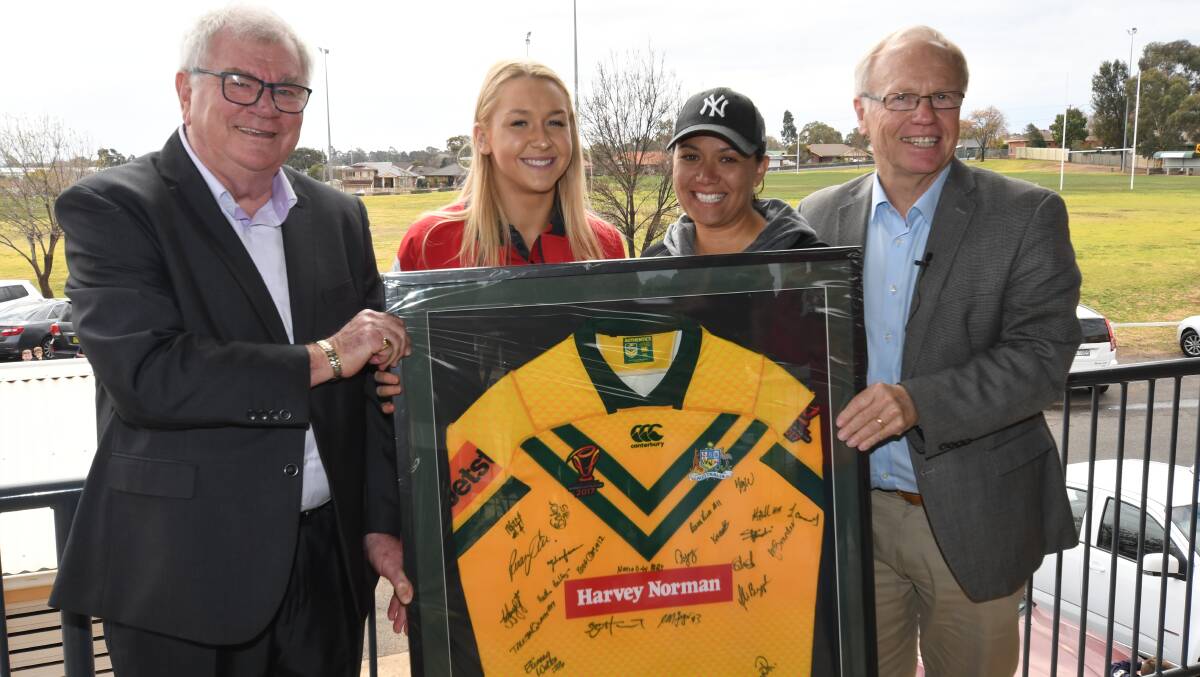 WORTHY WINNER: Kess Skinner (second from right) collected one of the NRL's major awards in August. Photo: AMY McINTYRE