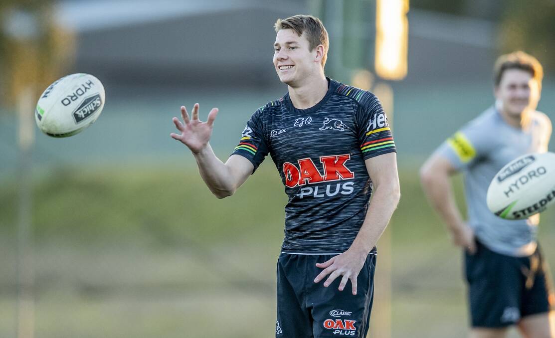 ENJOYING THE MOMENT: Matt Burton has a laugh during his first training session with the Panthers' NRL side on Wednesday night. Photo: NRL PHOTOS