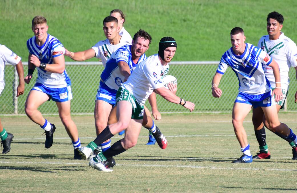 THAT TIME AGAIN: Calub Cook of Dubbo CYMS attempts to break through the Bathurst St Pat's defence in an under 21s match earlier this year. Picture: Nick Guthrie