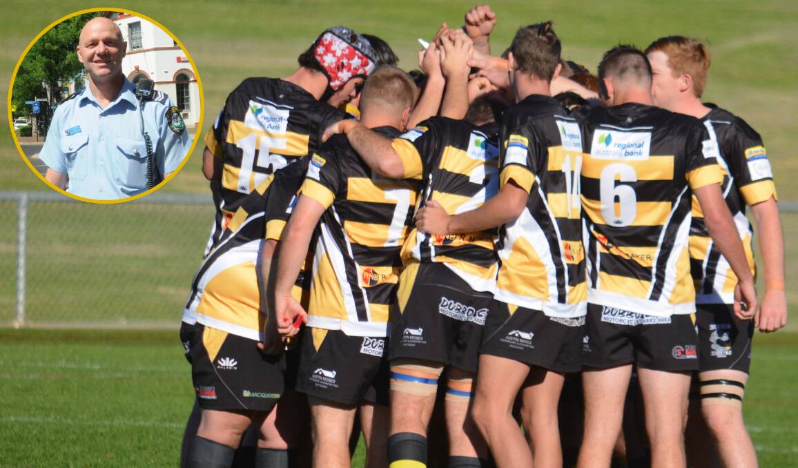 WORKING: Seeing the Dubbo Rhinos united for a cause is a point of pride for club president and police officer Ian Burns (inset). Photo: NICK GUTHRIE