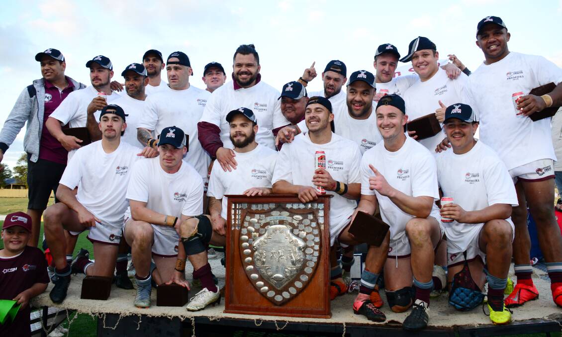 HIGHLIGHT: Aidan Ryan (front, third from left) and his teammates celebrate Wellington's 2019 premiership win. Photo: BELINDA SOOLE