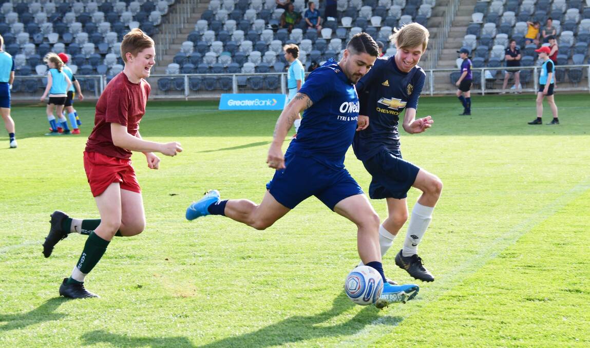 The Jets had a training run before having a clinic with juniors on Friday. Photo: AMY McINTYRE
