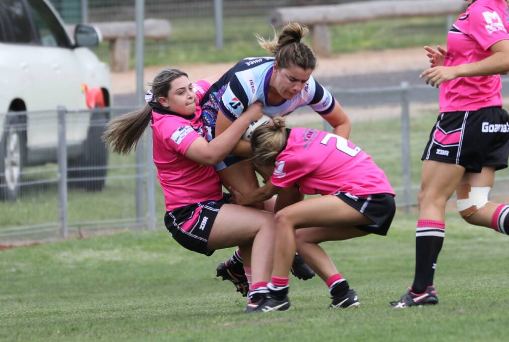 HARD-HITTING: Goannas' Maddi Chapman (left) and Jinnara Tyson work in defence during a meeting with the Mid West Brumbies earlier in the season. Photo: SIMONE KURTZ