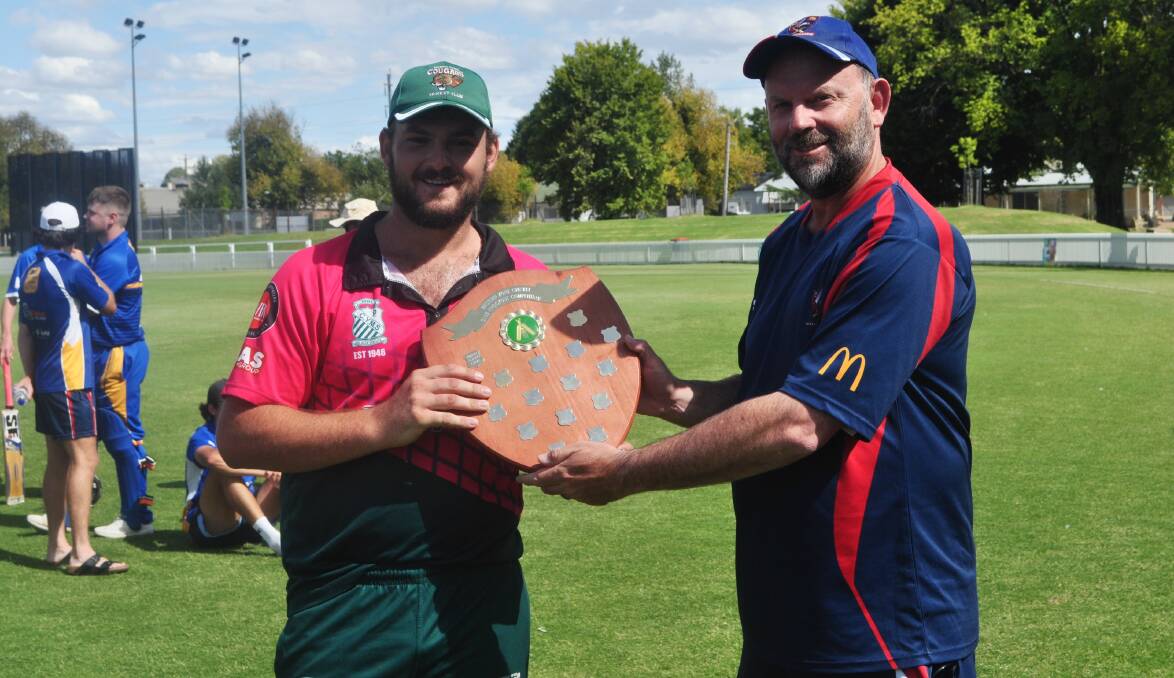 Western Zone president Mark Frecklington (right) with CYMS captain Ben Knaggs after last season's Club Knockout final. File picture