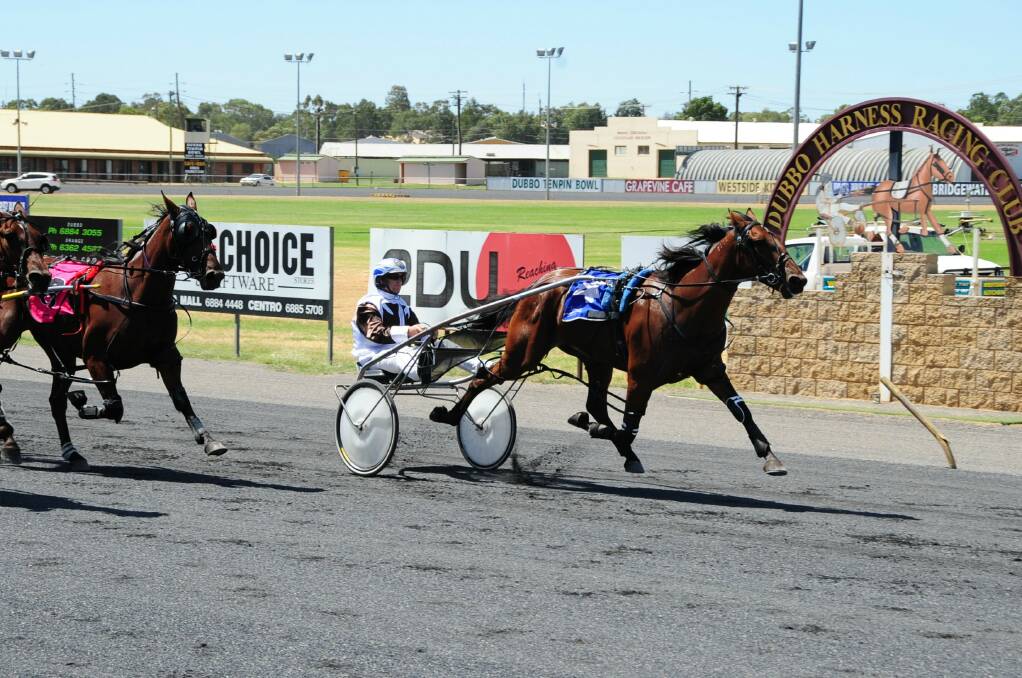 RETURN: Mat Rue and Karloo Damajor, pictured winning at Dubbo Paceway in the past, will be back in action at the track on Wednesday night. Photo: BELINDA SOOLE