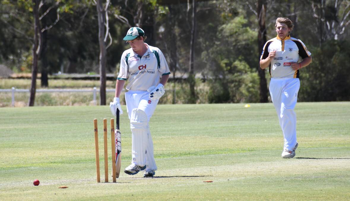GONE: Brayden McGhee departs after being dismissed by Newtown's Mitch Lincoln (right). Photo: AMY McINTYRE