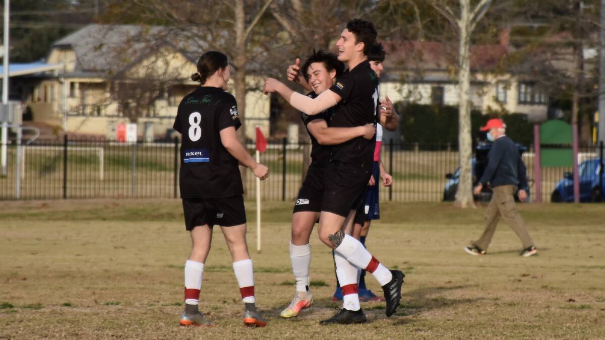 LEADING THE WAY: Ethan Willetts (right) celebrates after one of his four goals in Sunday's big win. Photo: KARCHERMOORE KAPTURES