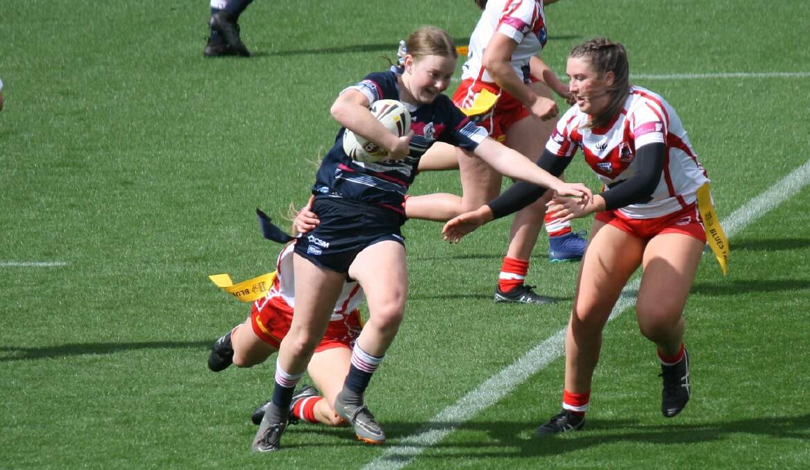 PLAY YOUR PART: Isabella Attwater and the Macquarie Raidettes are gearing up for finals football. Photo: MACQUARIE RAIDERS FACEBOOK