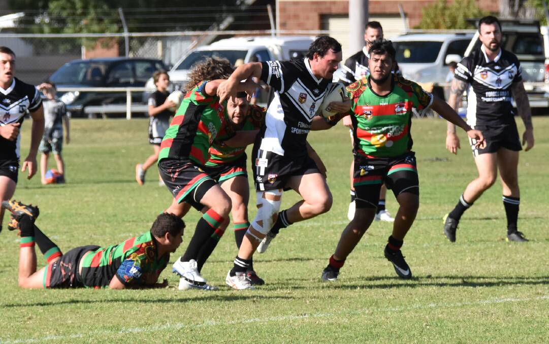 CHARGE: Ben Maguire and the Forbes Magpies started the 2018 season with a win over Westside and went on to win the title.