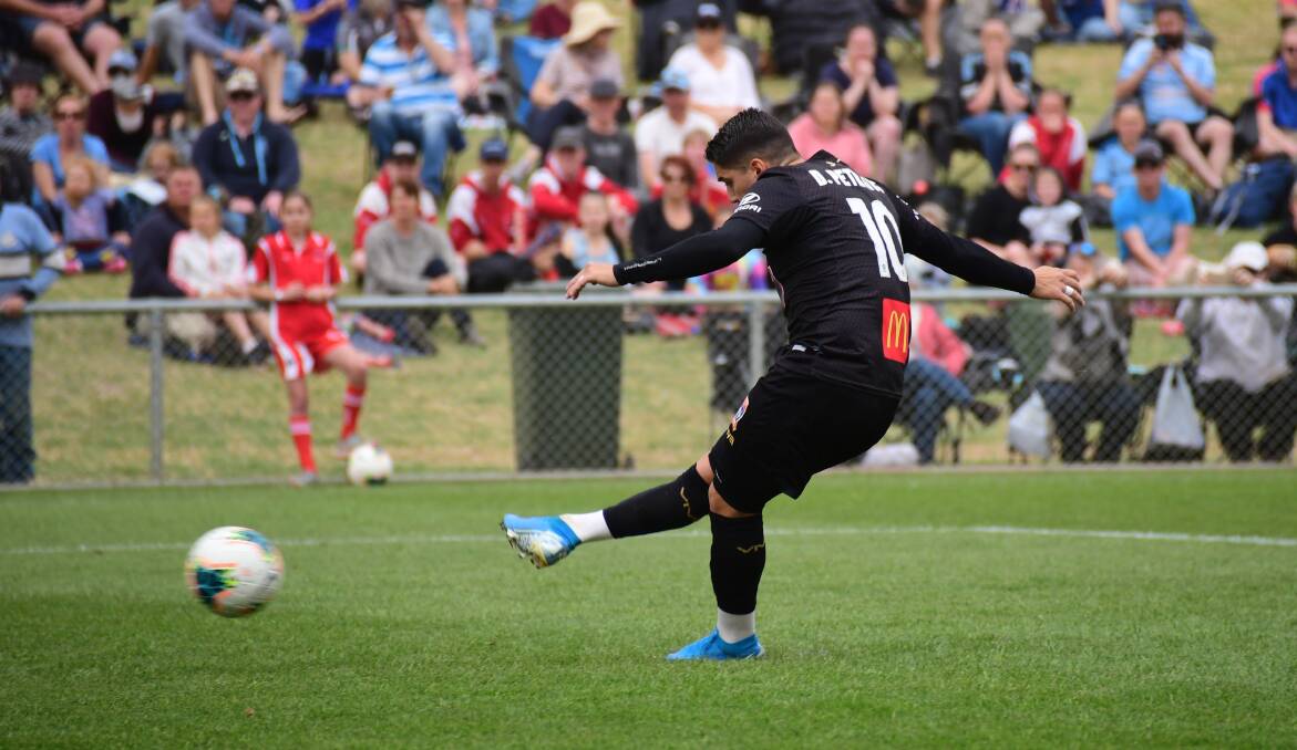 CLOSE: Dimi Petratos stuck this penalty attempt into the right upright on Saturday afternoon. Photo: AMY McINTYRE