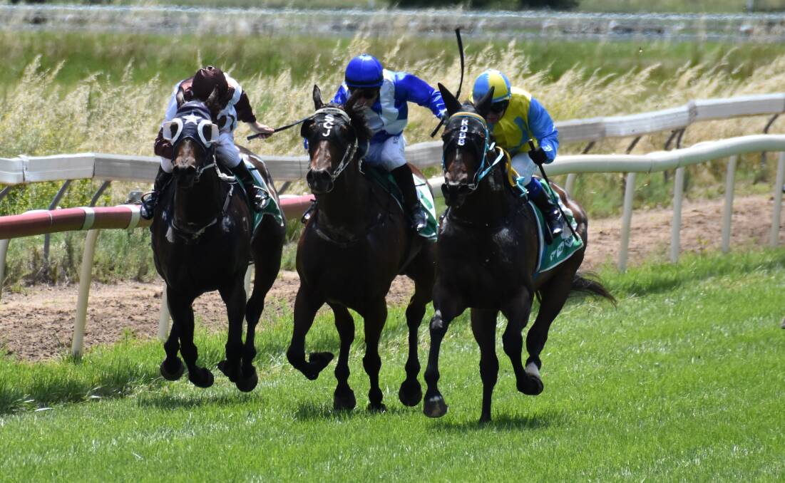 ON THE WAY: Lipstick Lil (right) powers to the lead at Mudgee Race Club on Friday. Picture: Jay-Anna Mobbs