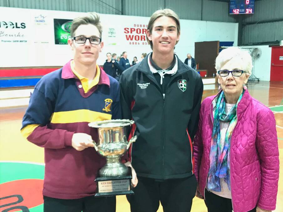 SPECIAL: Ken Eggleton's wife, Loris, and grandson, Harry, with Dubbo College sports captain, Hamish Grant. Photo: DUBBO COLLEGE