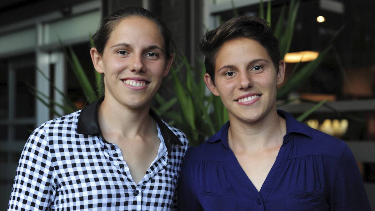 TWO OF THE BEST: Ashleigh Sykes (right) and twin sister Nicole together in early 2016. Photo: GRAHAM TIDY