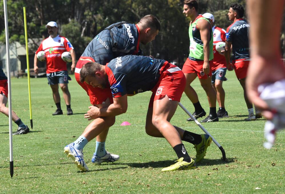 HARD SLOG: Dragons prop Kaide Ellis (right) says preseason torture sessions still beat being on the tools. Photo: DRAGONS MEDIA