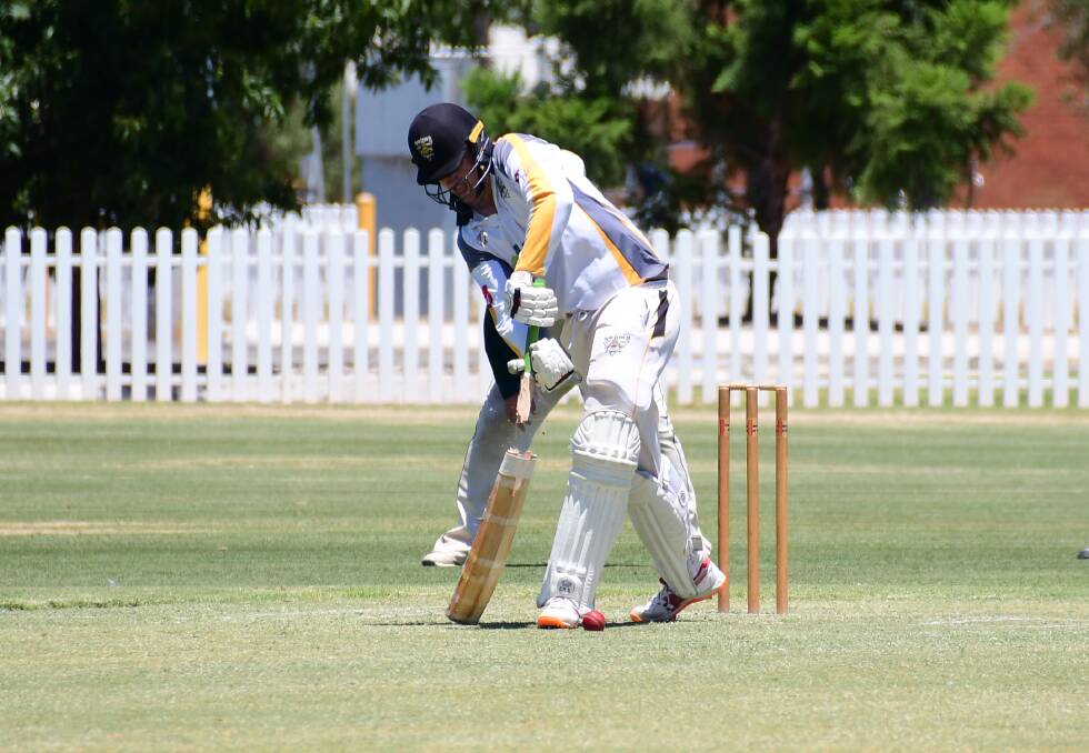 SPLIT IN TWO: Dan French top-scored for Newtown on Saturday but his innings wasn't without some drama. Photo: BELINDA SOOLE