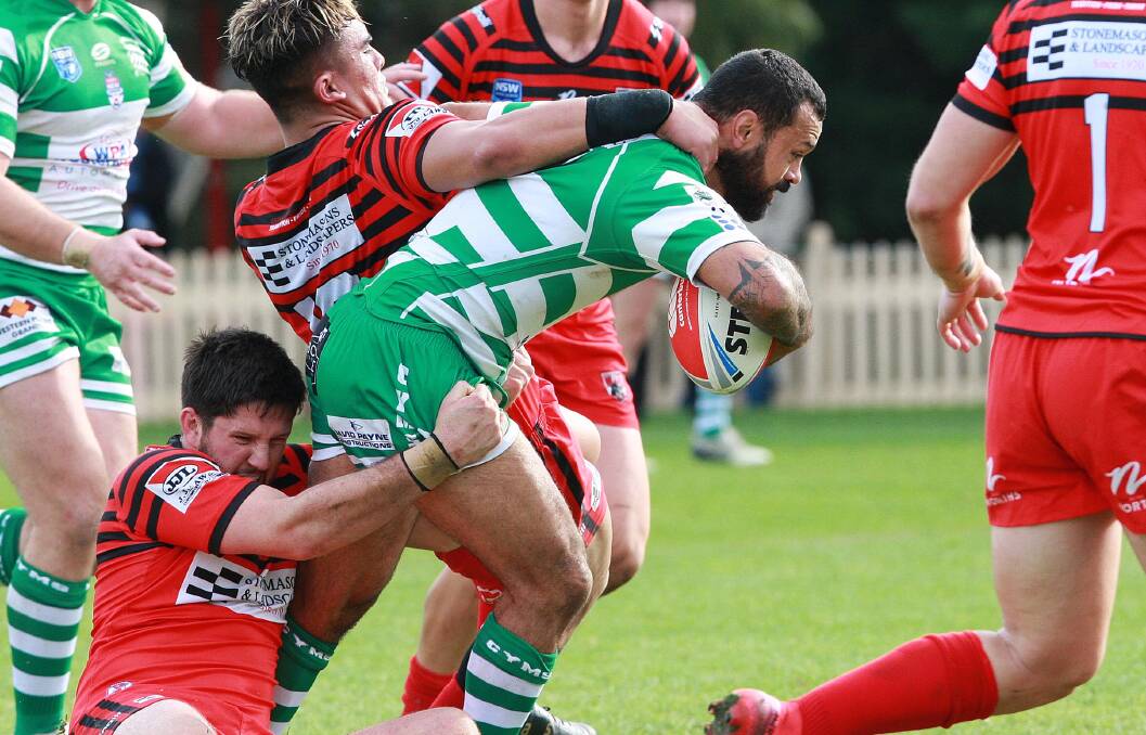 TAKE THEM ON: Jayson Bukuya in action during his CYMS debut again North Sydney last month. Photo: RUGBY LEAGUE REVIEW