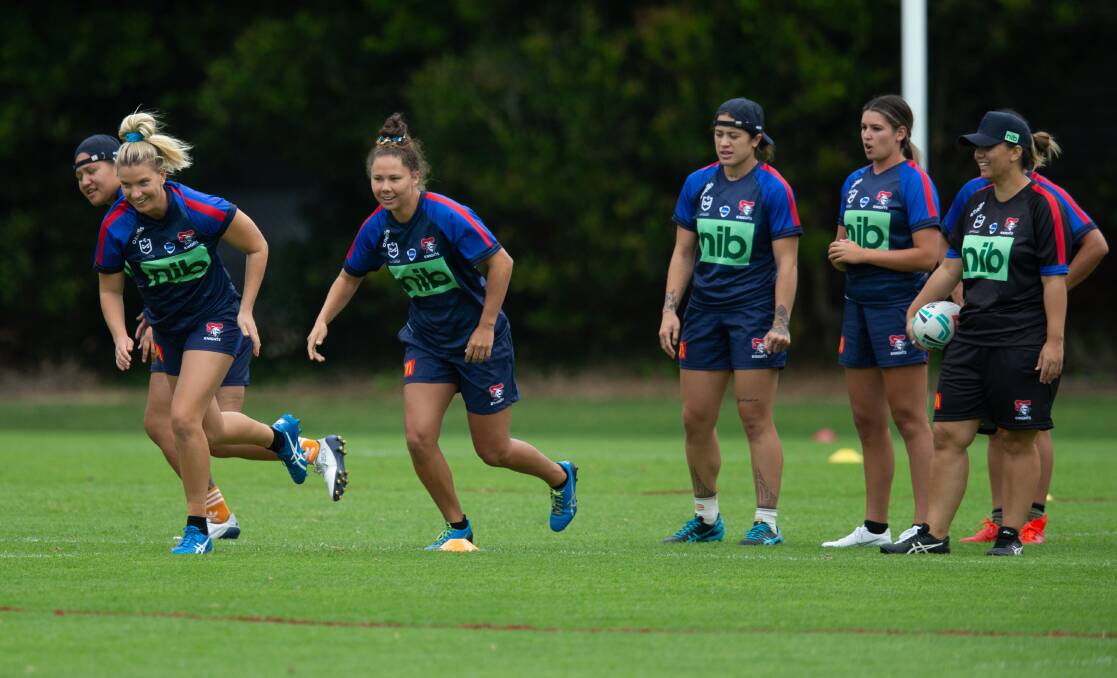TAKING IT IN: Jess Skinner (far right) casts an eye over proceedings at Knights training on Tuesday. Picture: Max Mason-Hubers