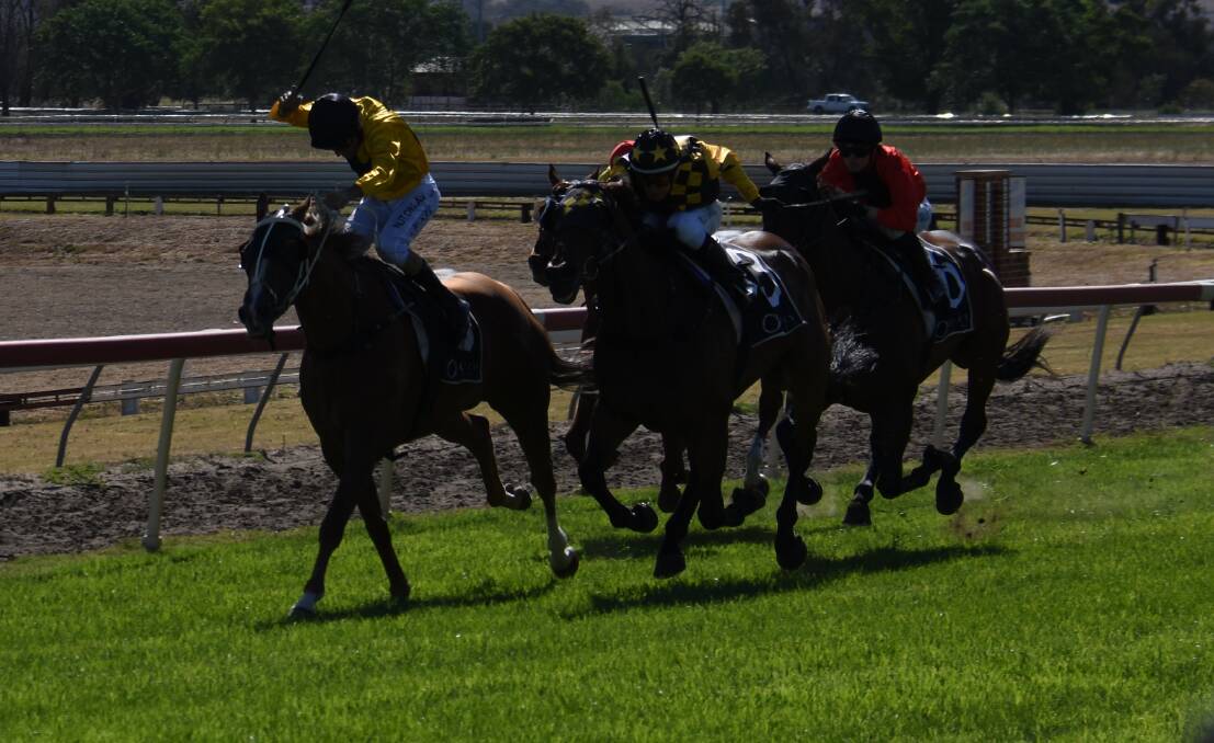 LEADING THE PACK: Hammond Lane fights off the challenge from Hirokin to claim the 2019 Mudgee Cup. Photo: JAY-ANNA MOBBS