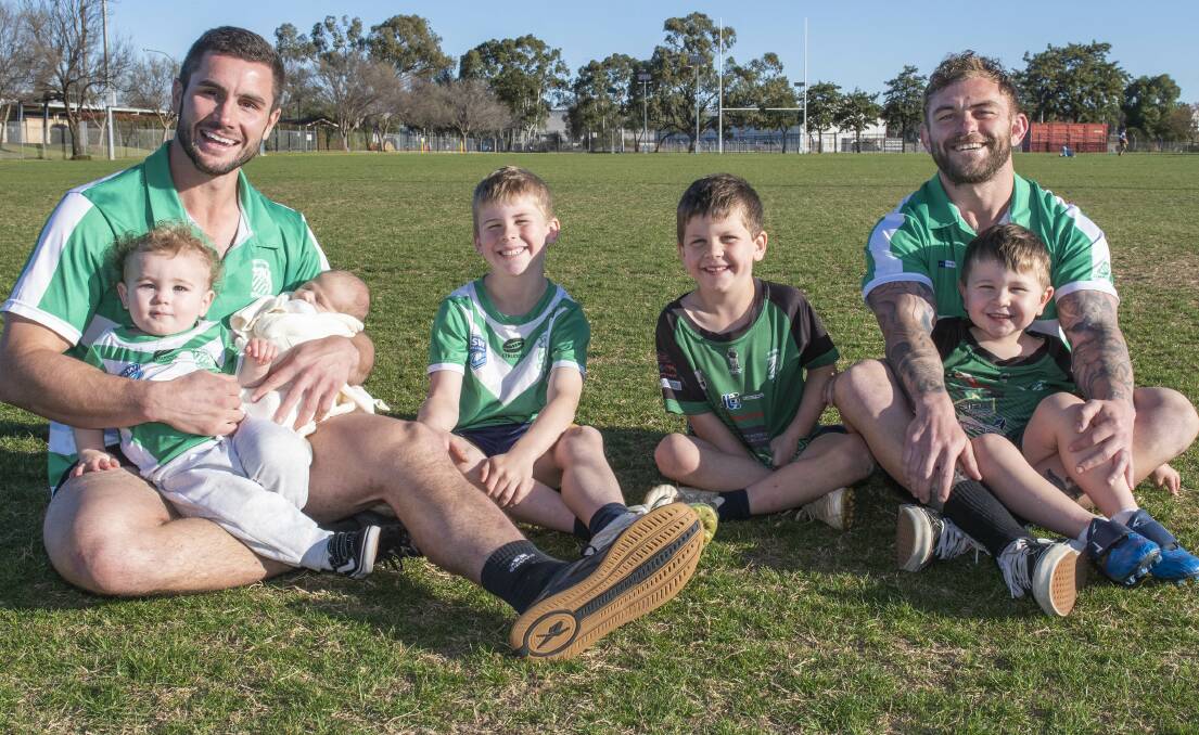 Jarryn Powyer with sons Rowdie, one, and Sonny, three weeks, and Jyie Chapman with his boys Beckham, seven, Maddix, six, and Jagger, three. Picture by Belinda Soole