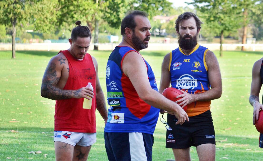 ON HIS WAY: Will Bunt (centre) has been forced to give up the Dubbo Demons' head coaching role. Photo: CRAIG THOMSON