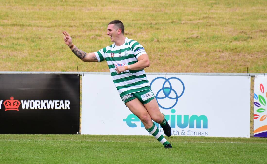 GOT IT: Corey Cox celebrates a try for CYMS earlier in the season. Photo: AMY McINTYRE