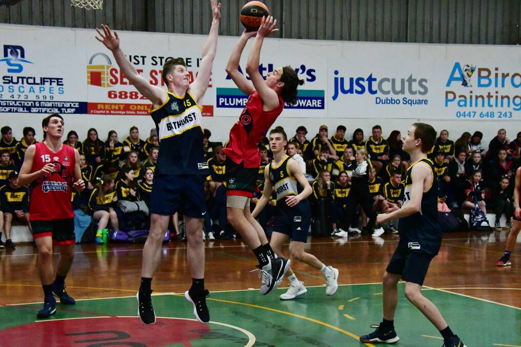 GET THERE: Brock Cameron takes flight towards the basket during Dubbo's win on Thursday. Photo: BELINDA SOOLE
