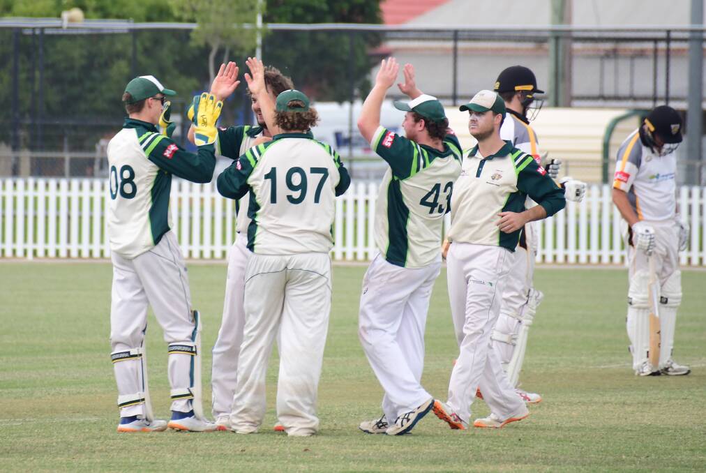 TOO GOOD: CYMS players celebrate a wicket during the most recent meeting with Newtown. Photo: AMY McINTYRE