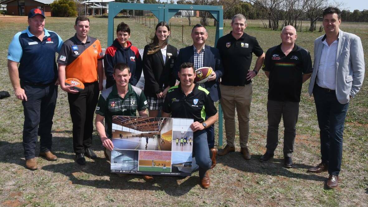 EXCITEMENT: Stakeholders from various sports and community groups with NSW deputy premier John Barilaro (fourth from right) at the proposed site. Photo: BELINDA SOOLE
