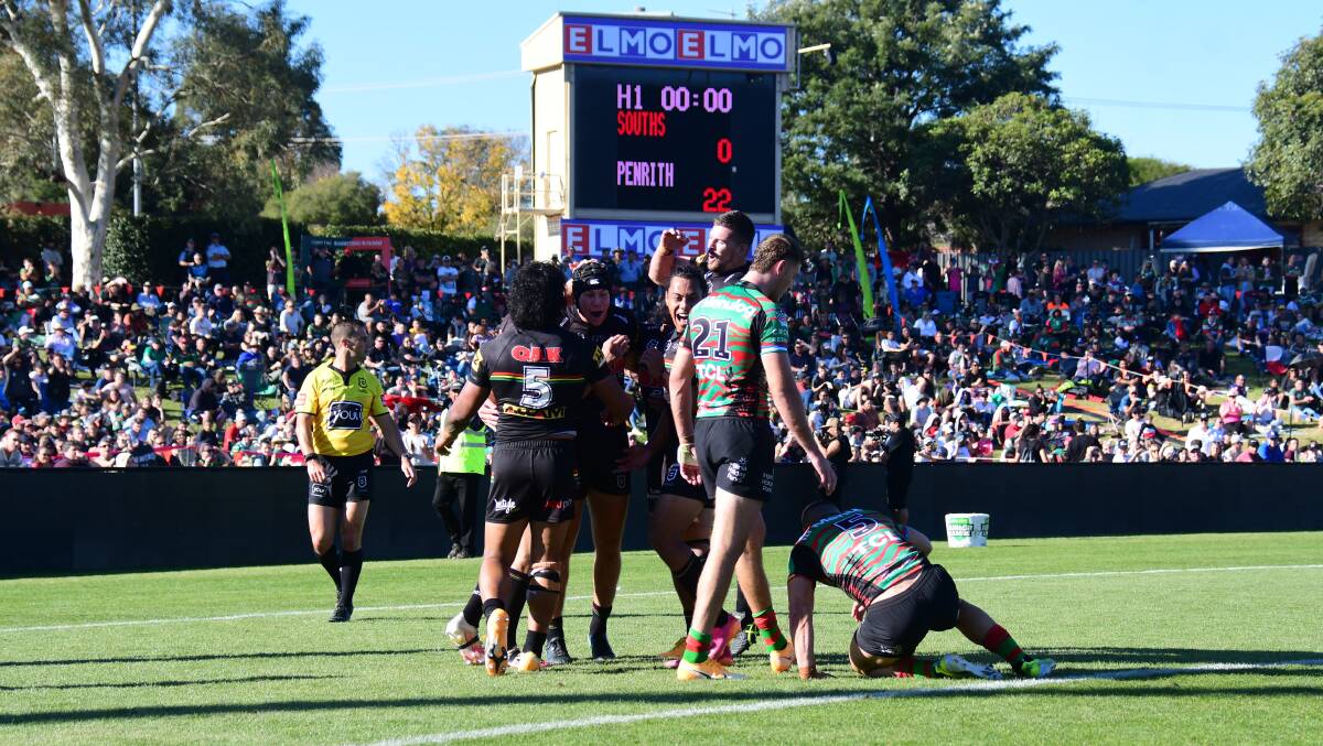 STRONG SHOWING: The Penrith Panthers celebrate a try during their round 11 win over South Sydney at Apex Oval. Photo: AMY McINTYRE