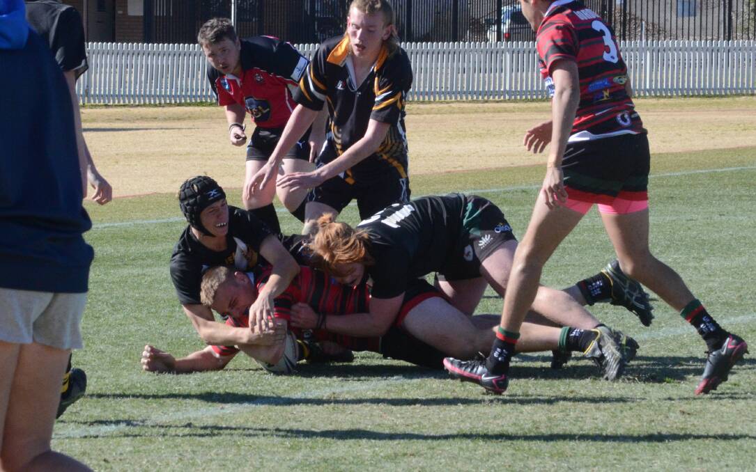 TRY TIME: Lachie O'Mally goes in to score during Dubbo's strong win in Orange on Tuesday. Photo: RILEY KRAUSE