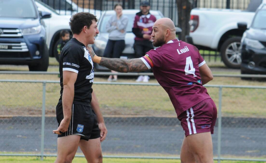 The battle between Mitch Andrews, left, and Blake Ferguson was one of the highlights of Sunday's match. Picture by Nick Guthrie