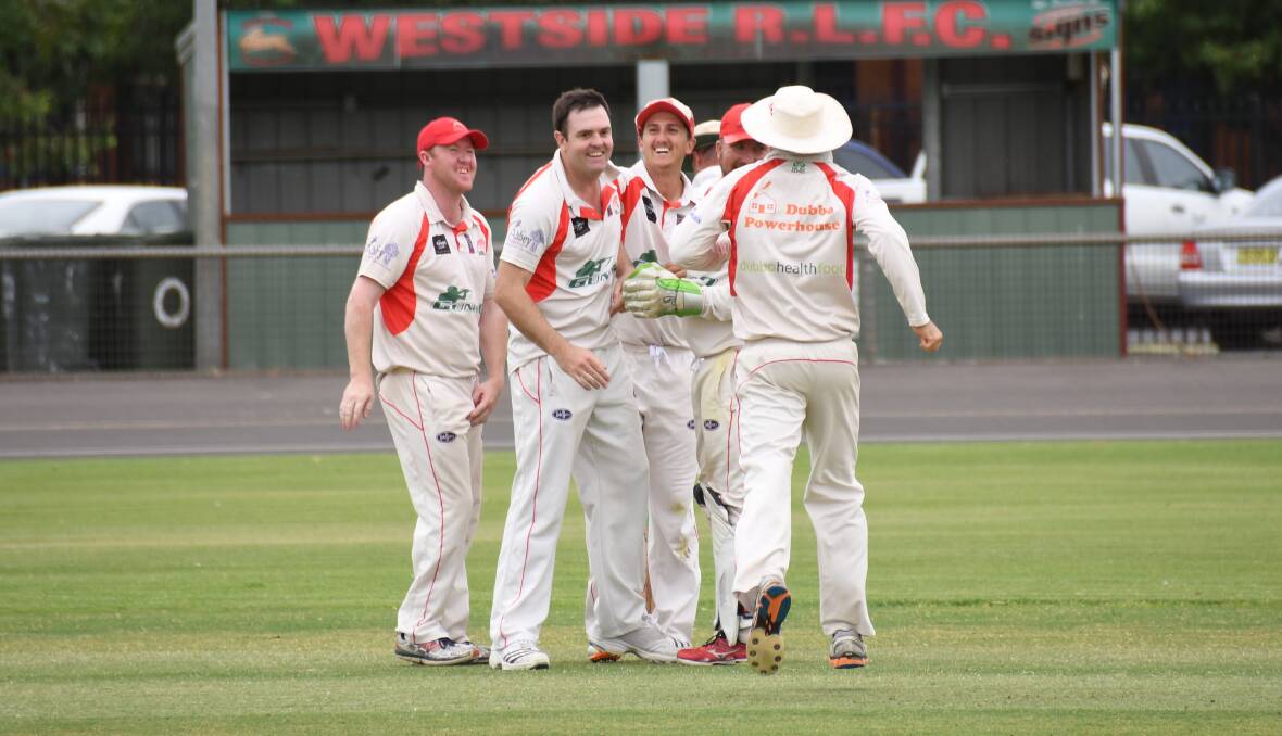 TOO GOOD: Ben Semmler (second from left) and his Colts teammates celebrate a wicket during Saturday's win over Macquarie. Photo: AMY McINTYRE