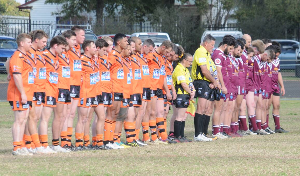 Nyngan and Wellington players together prior to a game last season. Both clubs have battled number worries at different times in recent years. Picture by Tom Barber