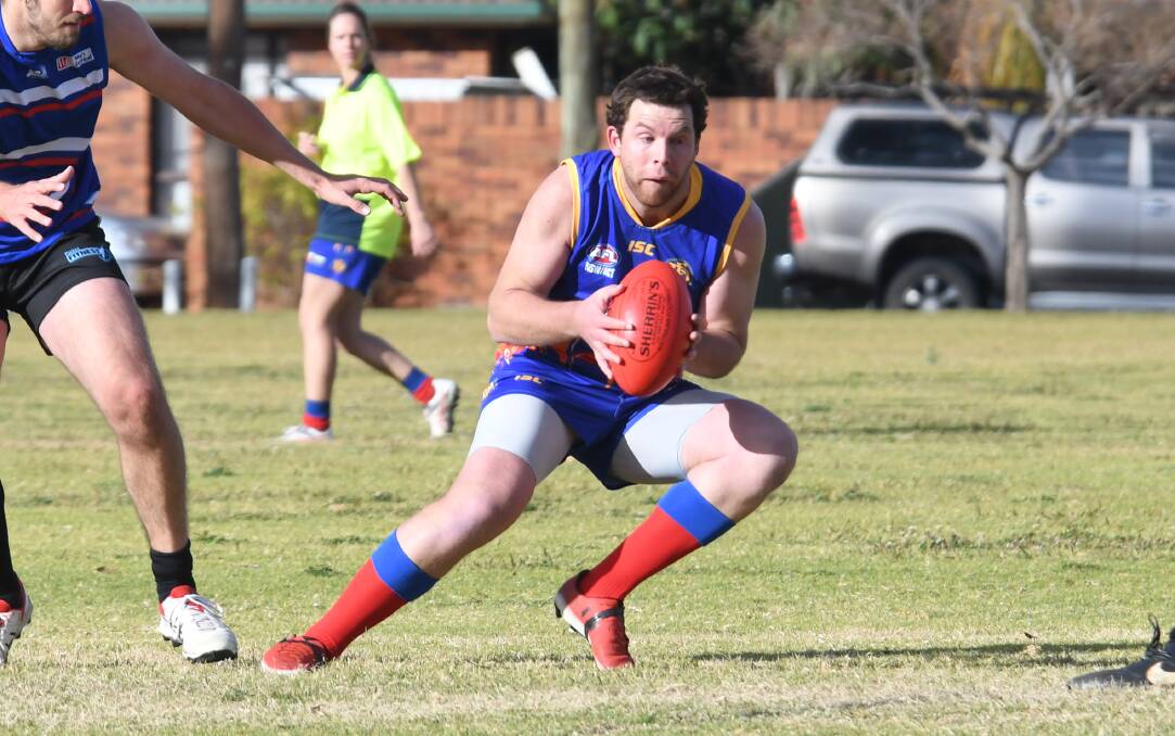 The Demons men followed the women and won in a big way on Saturday. Photos: AMY McINTYRE
