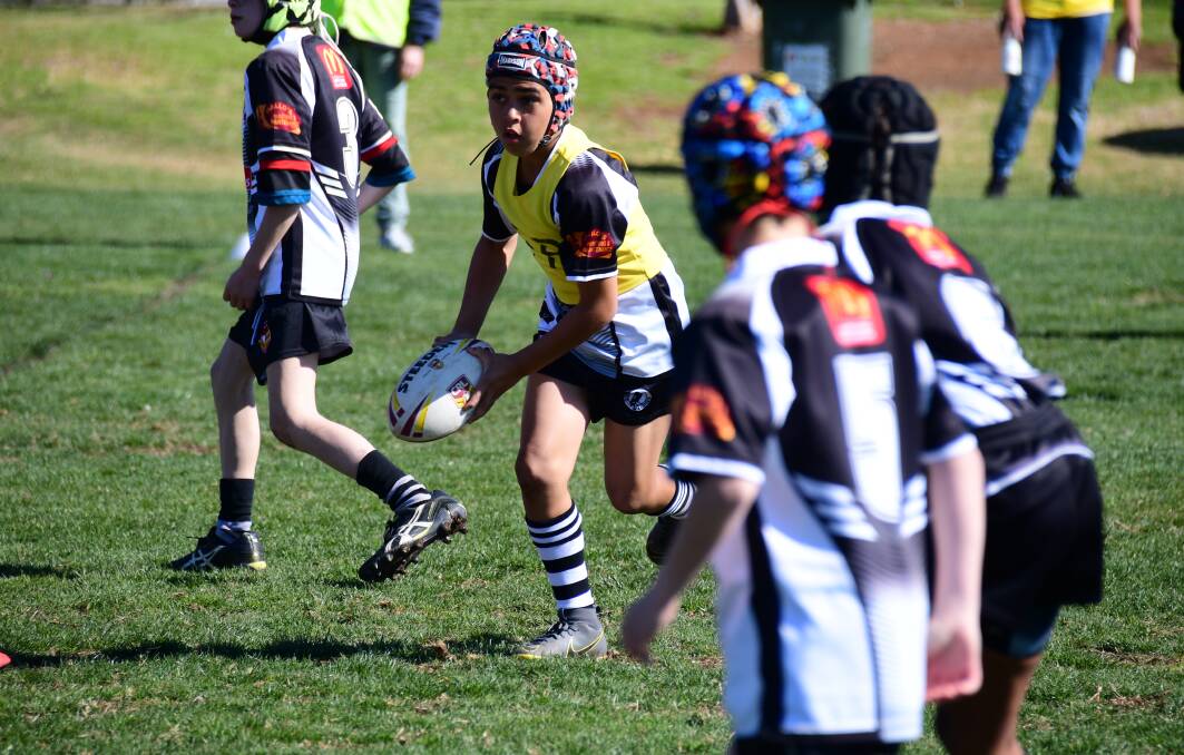 NOT THIS TIME: Bryson Read in action for the Magpies under 11s last year. No Magpies team will take to the field in 2020. Photo: AMY McINTYRE