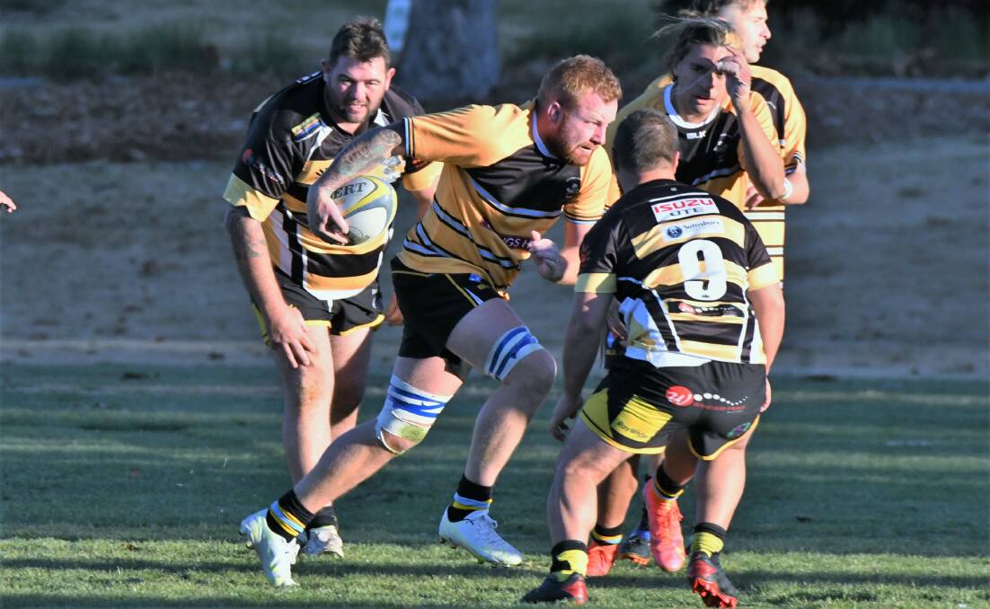ON HIS WAY: CSU's Sam Chamberlain makes his way past the Dubbo Rhinos defence during Saturday's big win. Photo: CHRIS SEABROOK