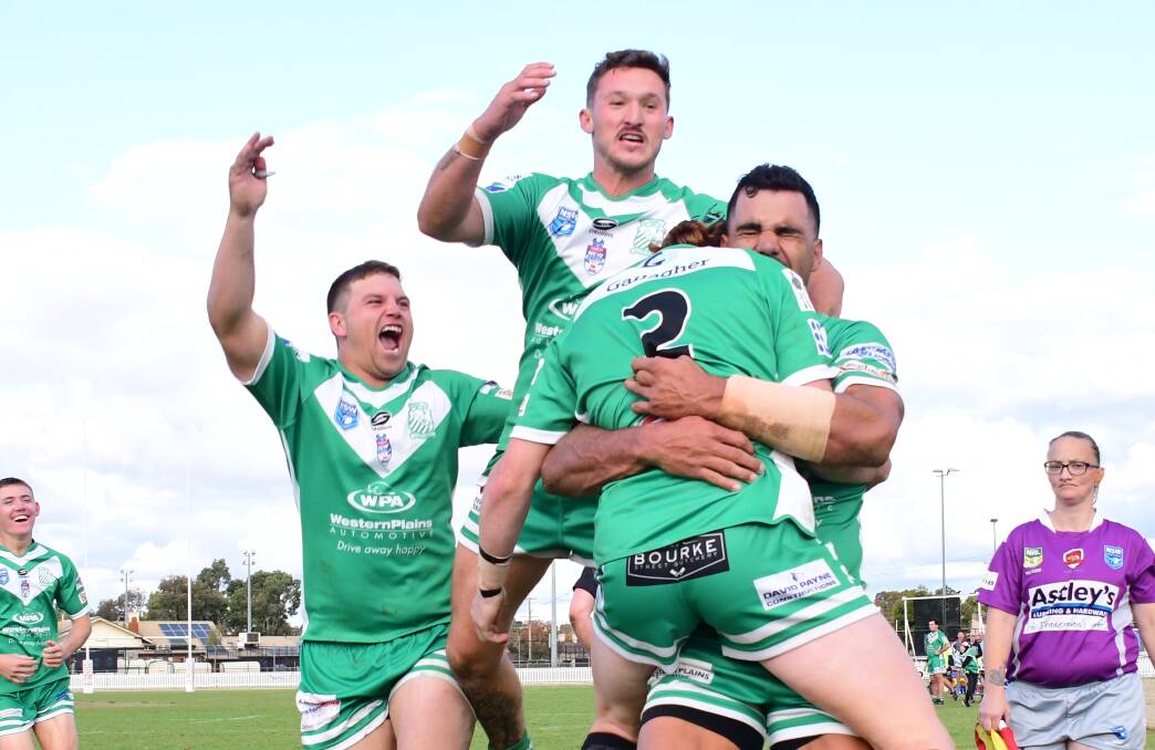 SPECIAL: CYMS first grade players celebrate a try against Nyngan earlier in the season. Photo: AMY McINTYRE