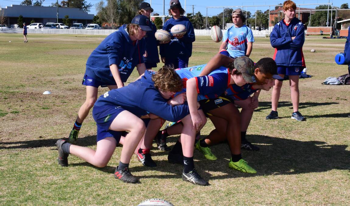 BUILDING TO THE BIG ONE: The Dubbo Roos under 15s Blues forwards hard at work at training in the build-up to this weekend's grand final. Photo: BELINDA SOOLE