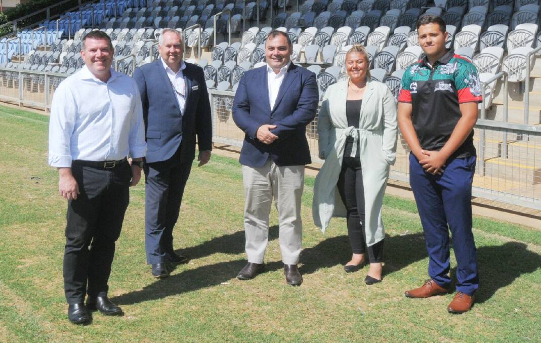 READY: Dubbo MP Dugald Saunders, Dubbo Regional Council CEO Michael McMahon, Souths' chief commercial officer Shannon Donato Shannon Donato, and Alisha Parker-Elrez and Qunicy Ross of Souths Cares. Photo: NICK GUTHRIE