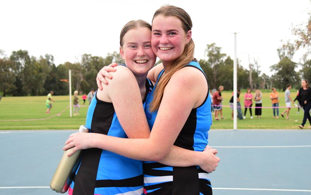 FAMILY FINALS: Isabella (left) and Brooklon Attwater after playing against each other in last weekend's netball grand final. Photo: AMY McINTYRE