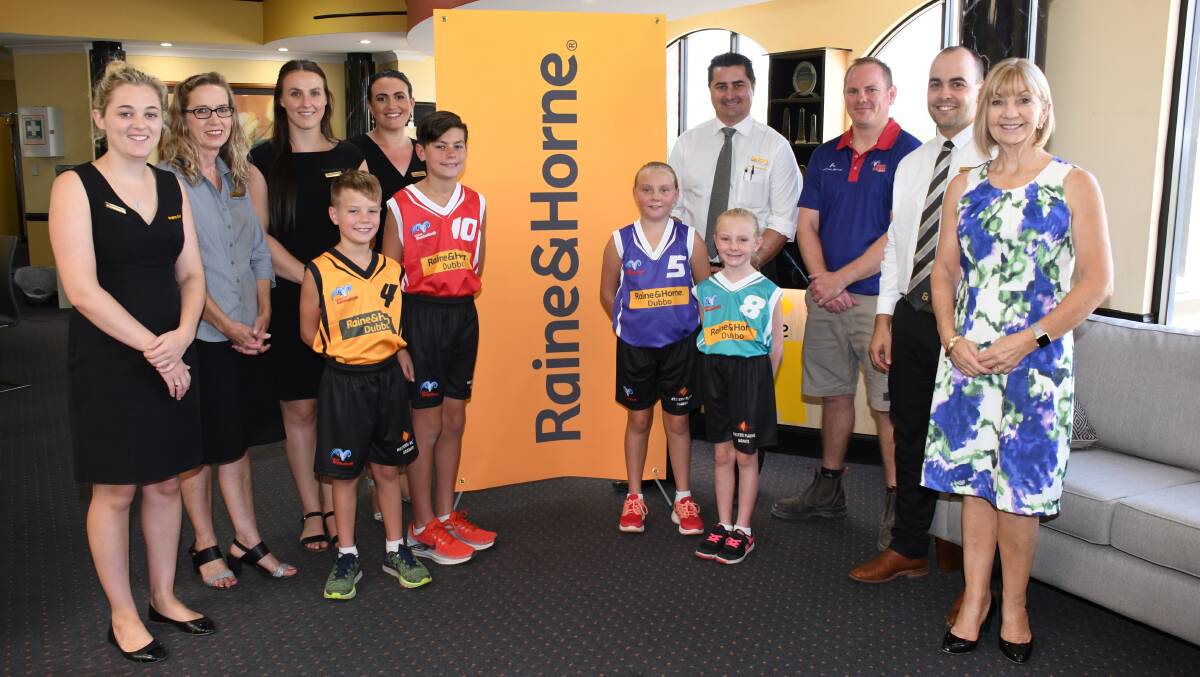 READY: Hale Gordon and Ken Mongan (third and fourth from right), with Raine and Horne staff and junior players, can't wait to see what is achieved in 2019 and beyond. Photo: BELINDA SOOLE
