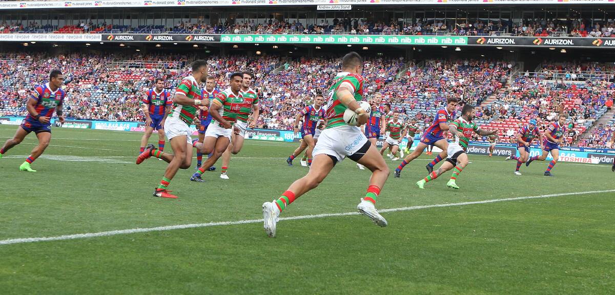 MOMENT TO TREASURE: Coonamble junior Braidon Burns runs around on his way to scoring his first try in the NRL. Photo: GETTY IMAGES