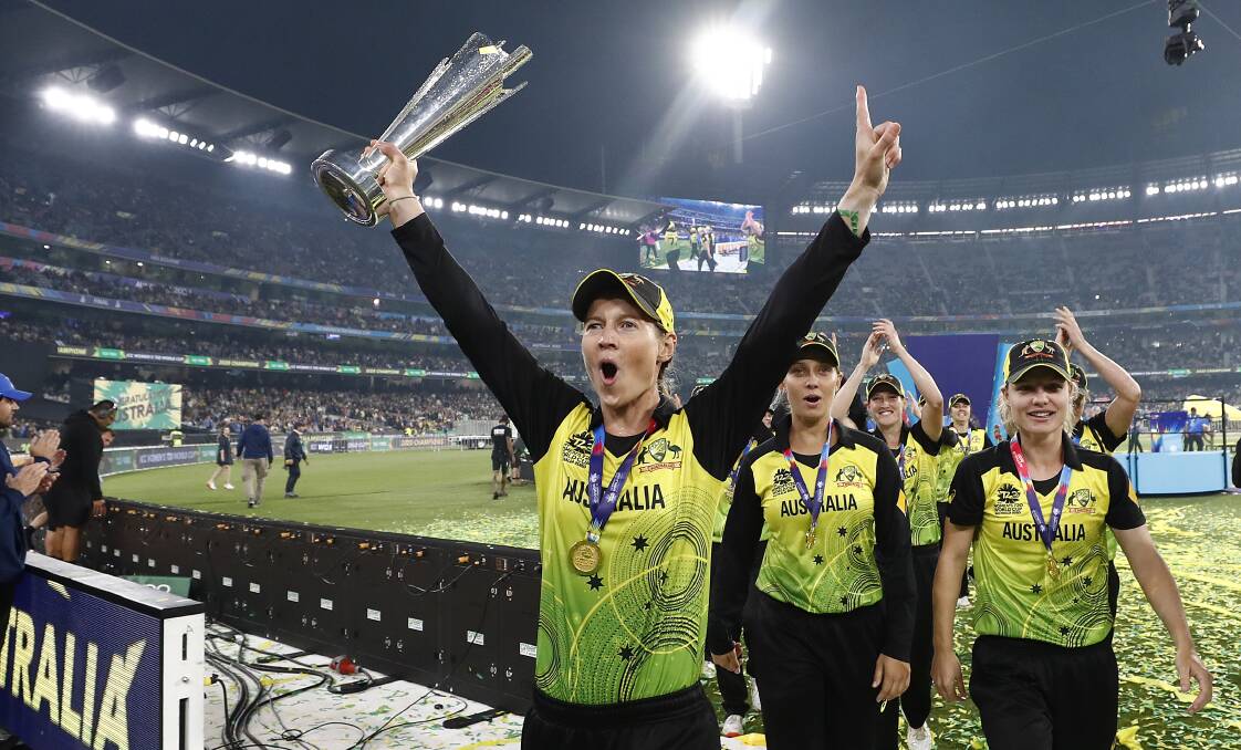 SPECIAL: Australian captain Meg Lanning celebrates with the World Cup Trophy after Sunday night's win. Photo: GETTY IMAGES