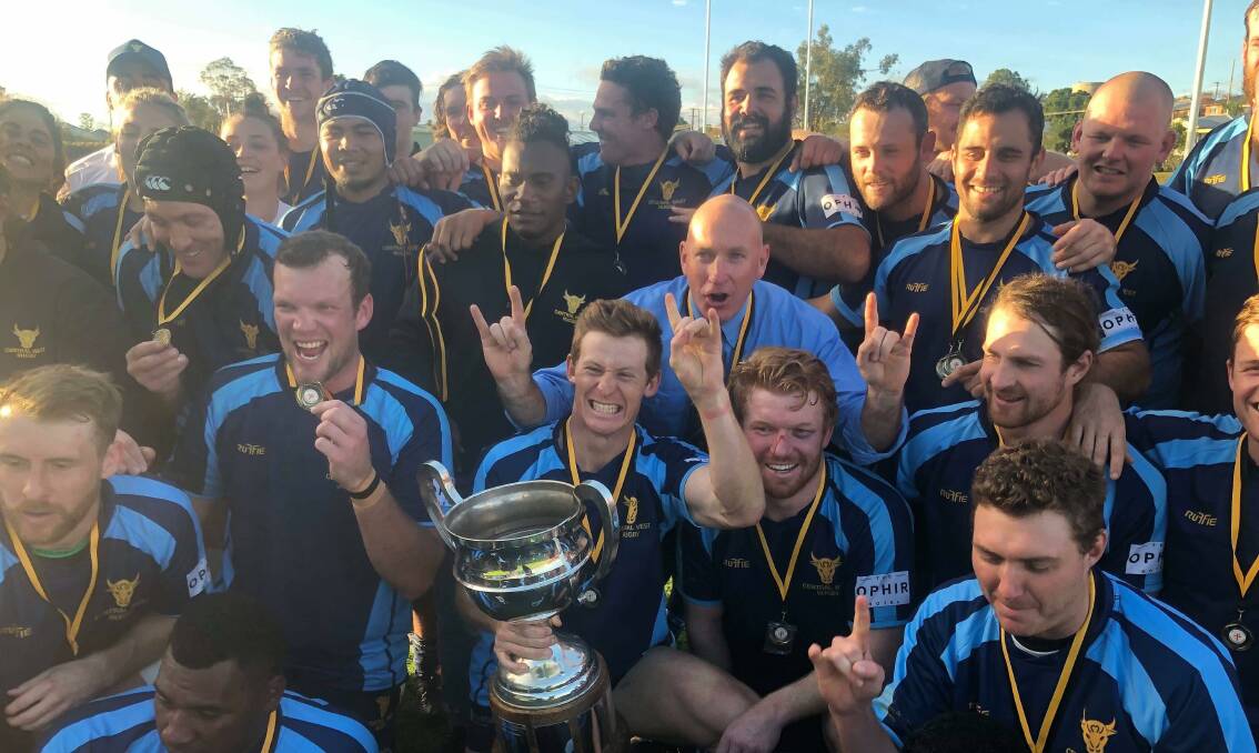 GO AGAIN: Dean Oxley (centre) with his Central West players after winning the 2019 Caldwell Cup. Photo: CONTRIBUTED