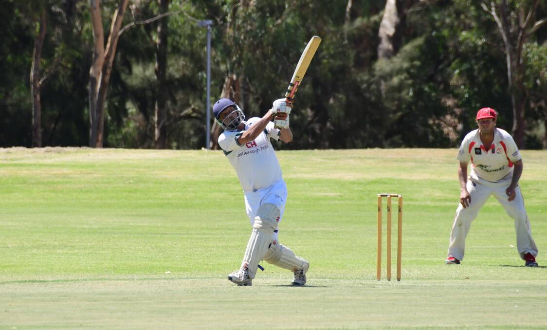 WHACK: CYMS Green's Brian Carroll hits out in his crucial knock of 27 at Lady Cutler 4 on Saturday. Photo: AMY McINTYRE