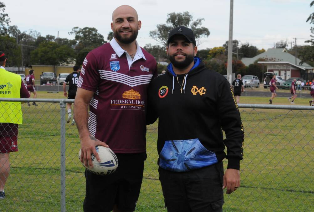 Blake Ferguson with his brother Corey Sutherland at Kennard Park ahead of the NRL star's homecoming match with the Wellington Cowboys. Picture by Nick Guthrie