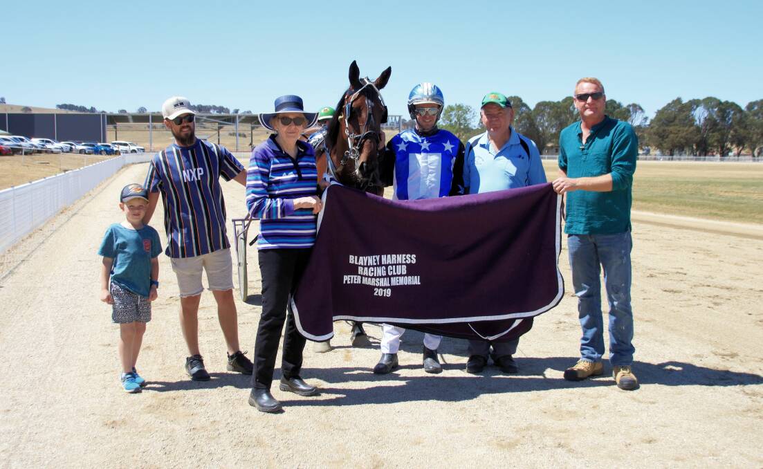 SPECIAL: Tom Pay (centre) with connections and officals after Hammertime Harley won at Blayney on Sunday. Photo: COFFEE PHOTOGRAPHY